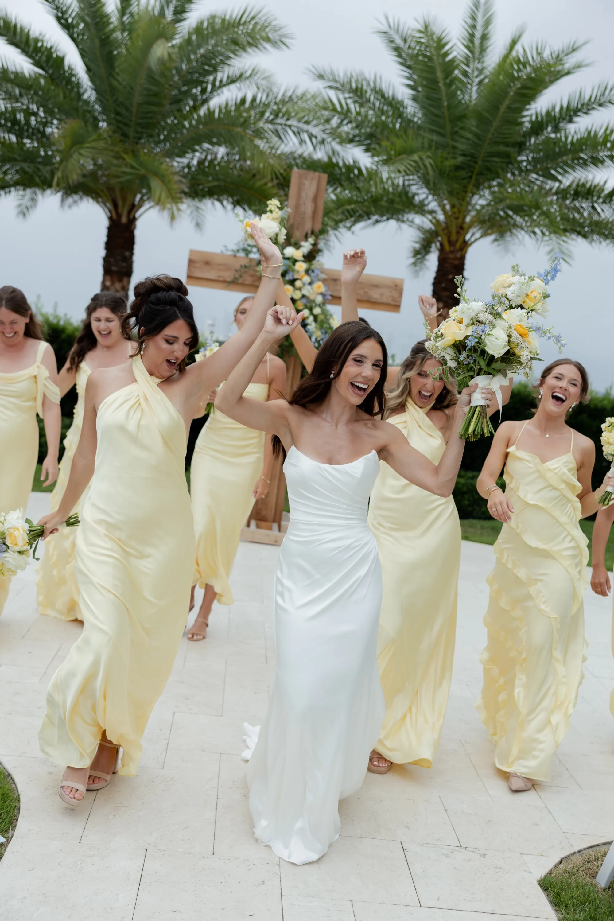 Savannah celebrating with her bridesmaids on the white stone