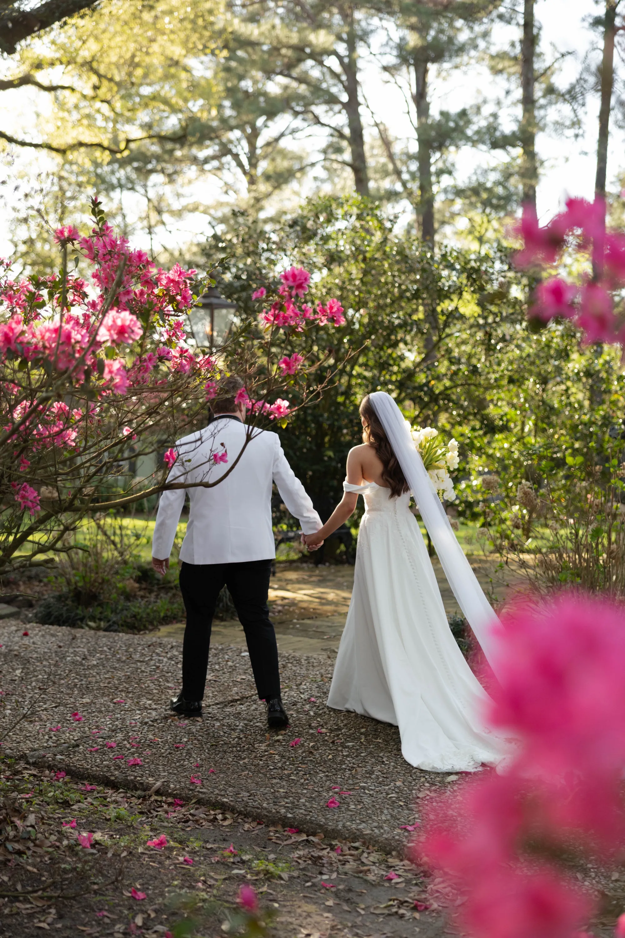 Hand in hand through the azalea garden in full bloom