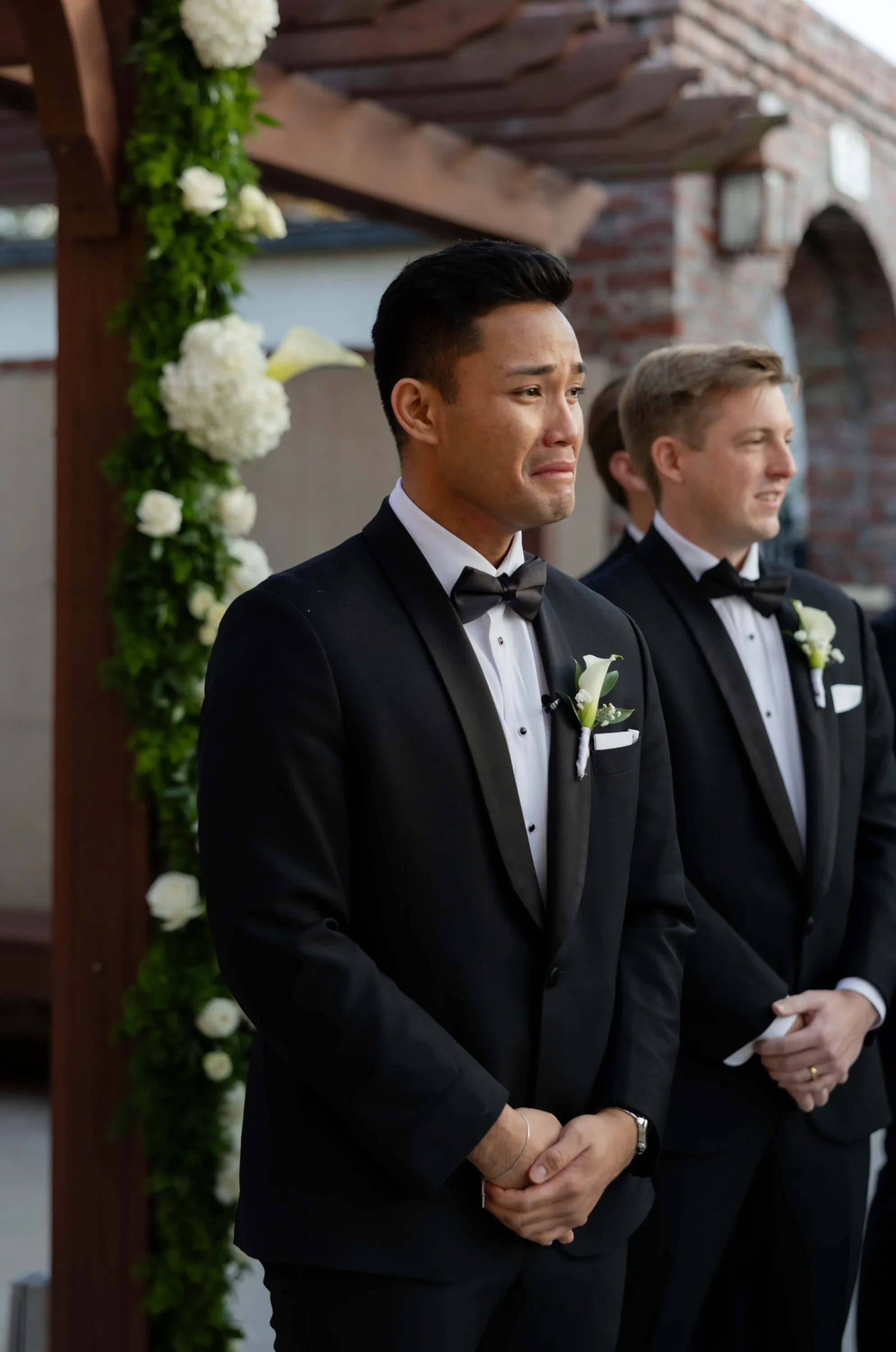 Edgar tearing up as Lily walks down the aisle
