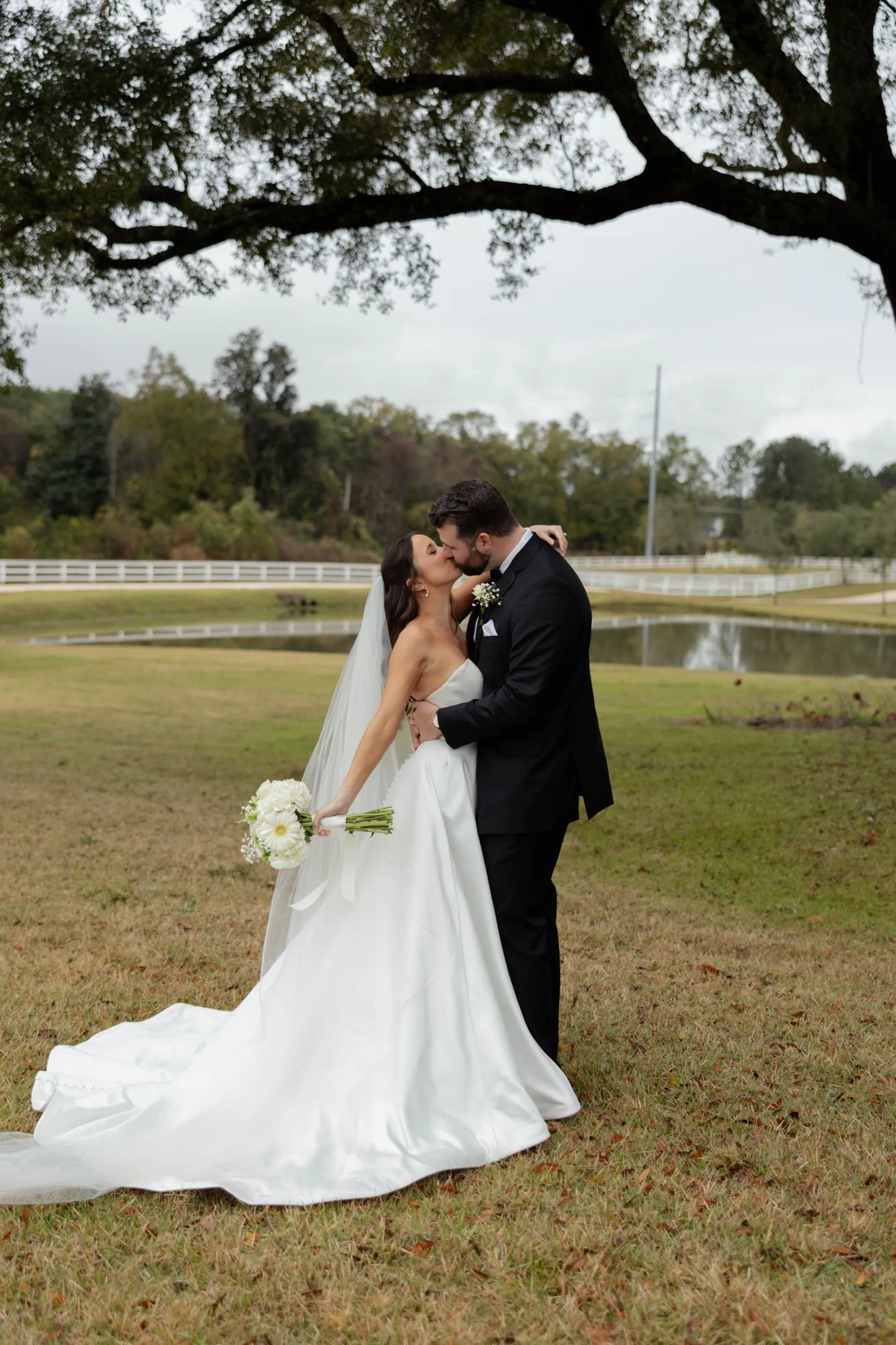 A kiss under the live oak by the pond