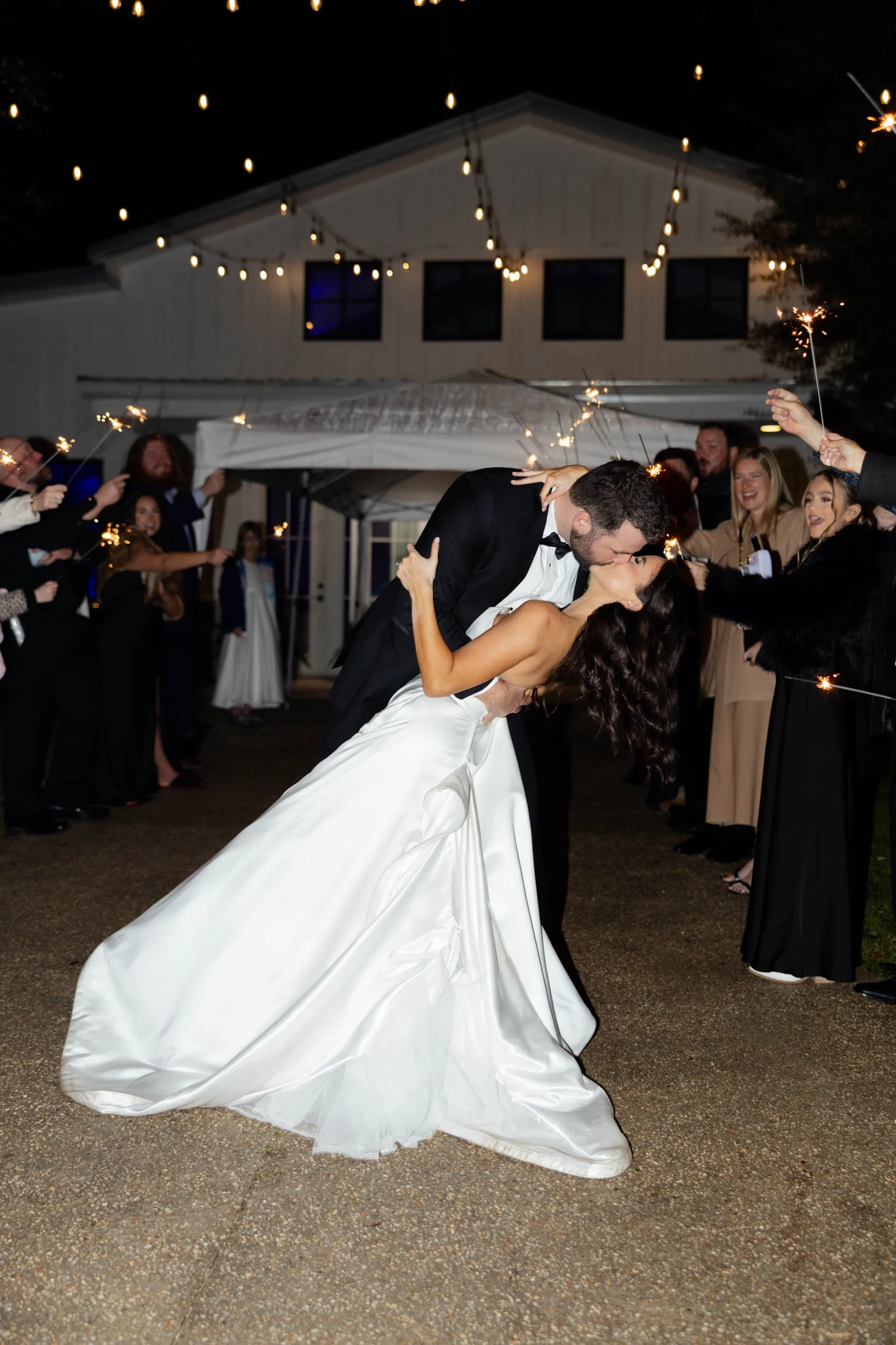 The sparkler send-off — one last dip kiss in the night